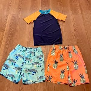 Tea Collection size 12 swim trunks and rash guard